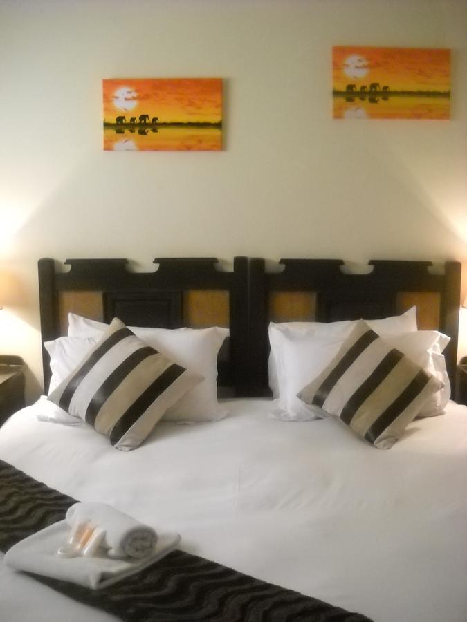 The Beverly Hills Guest Lodge 팔라보르와 객실 사진